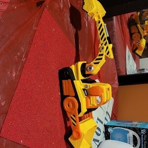 Vibrant Yellow and Black Paw Patrol Toy Excavator